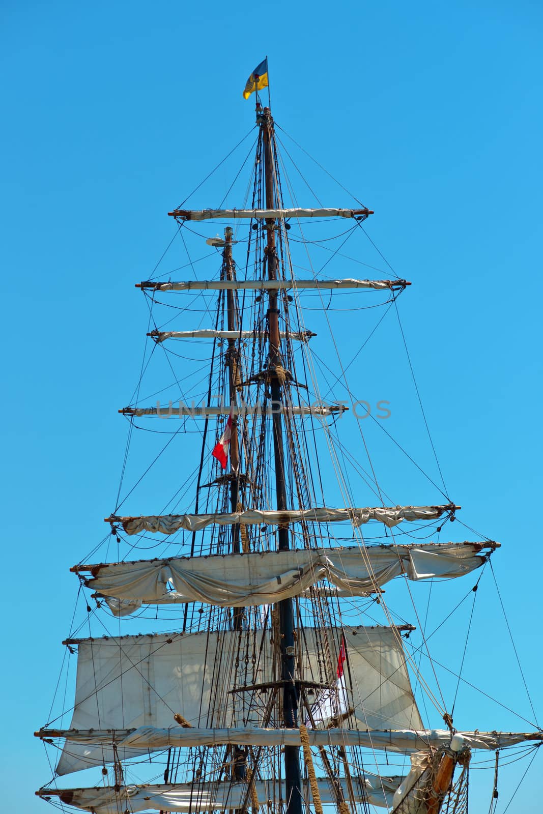 Masts And Ropes- …closeup of mast and ropes on a sailing ship 