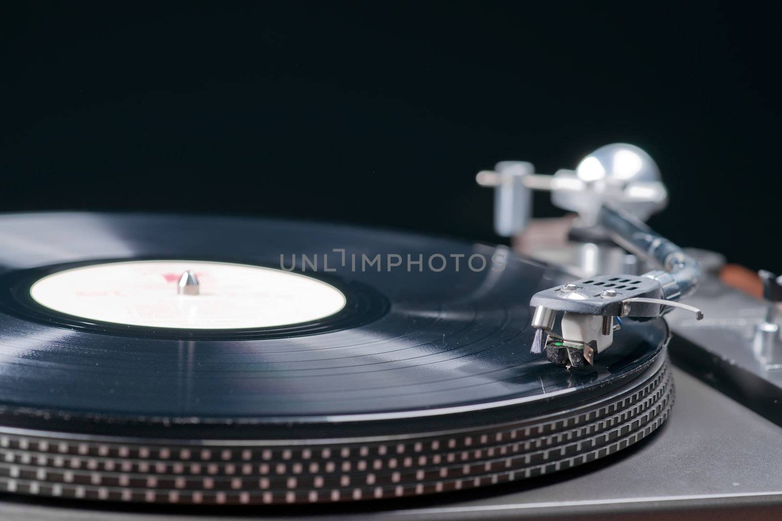 Close up of a black record being played