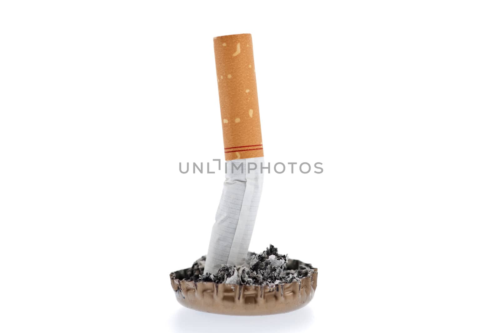 Cigarette butt and ash in a bottle cap by Marcus
