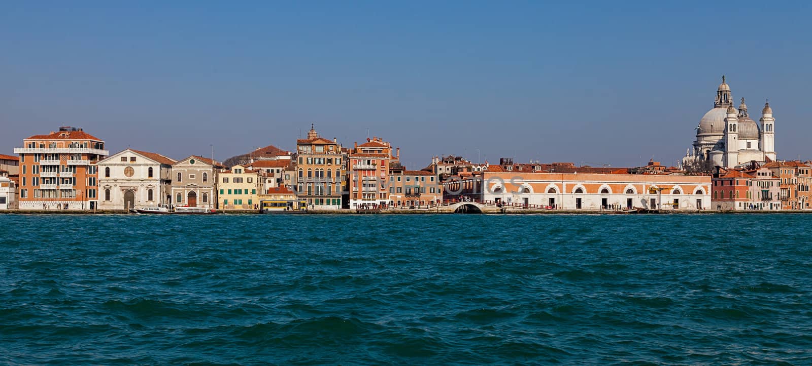 Specific image of traditional houses near the Grand Canal in Venice, Italy.