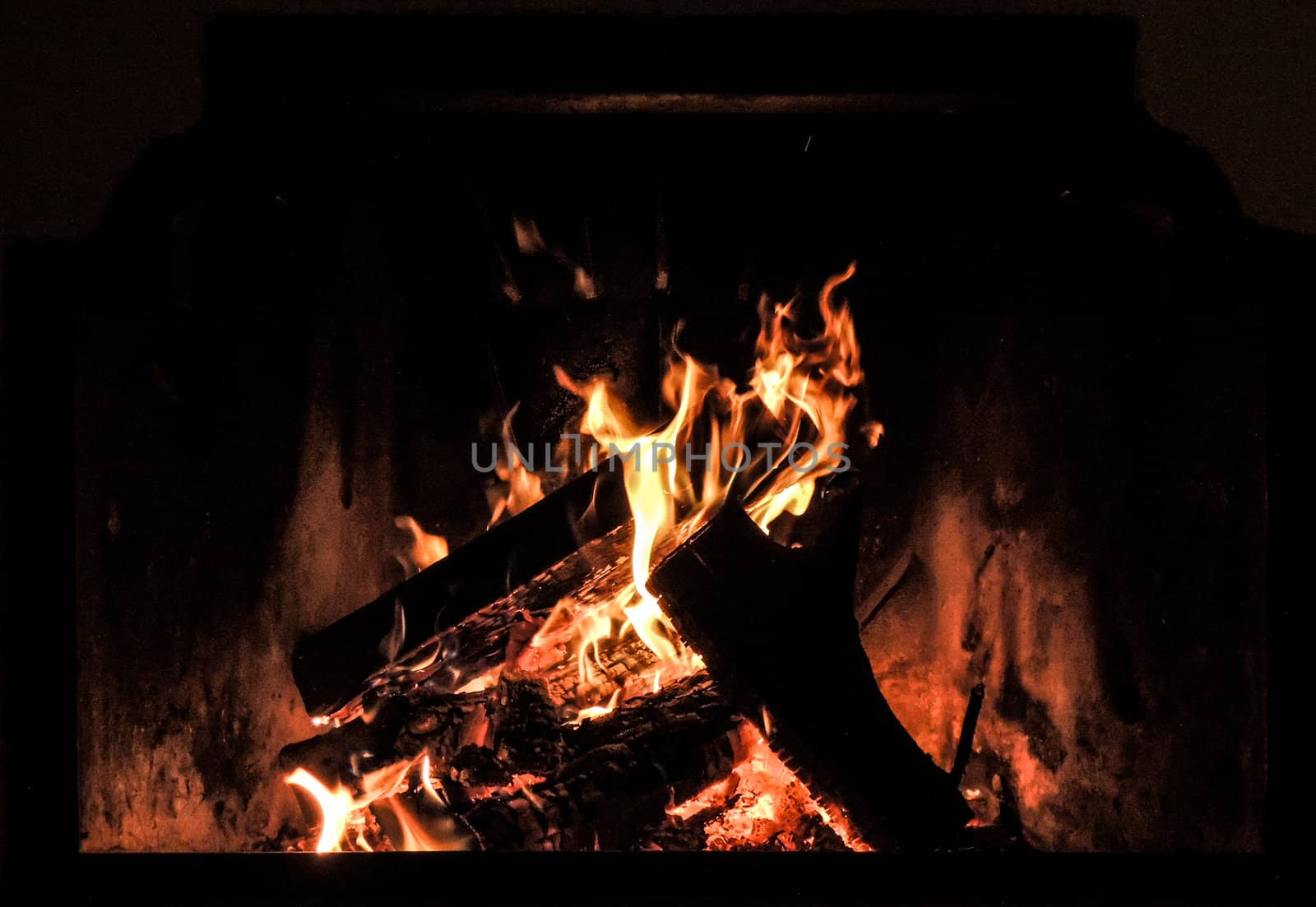 Logs burning in fireplace