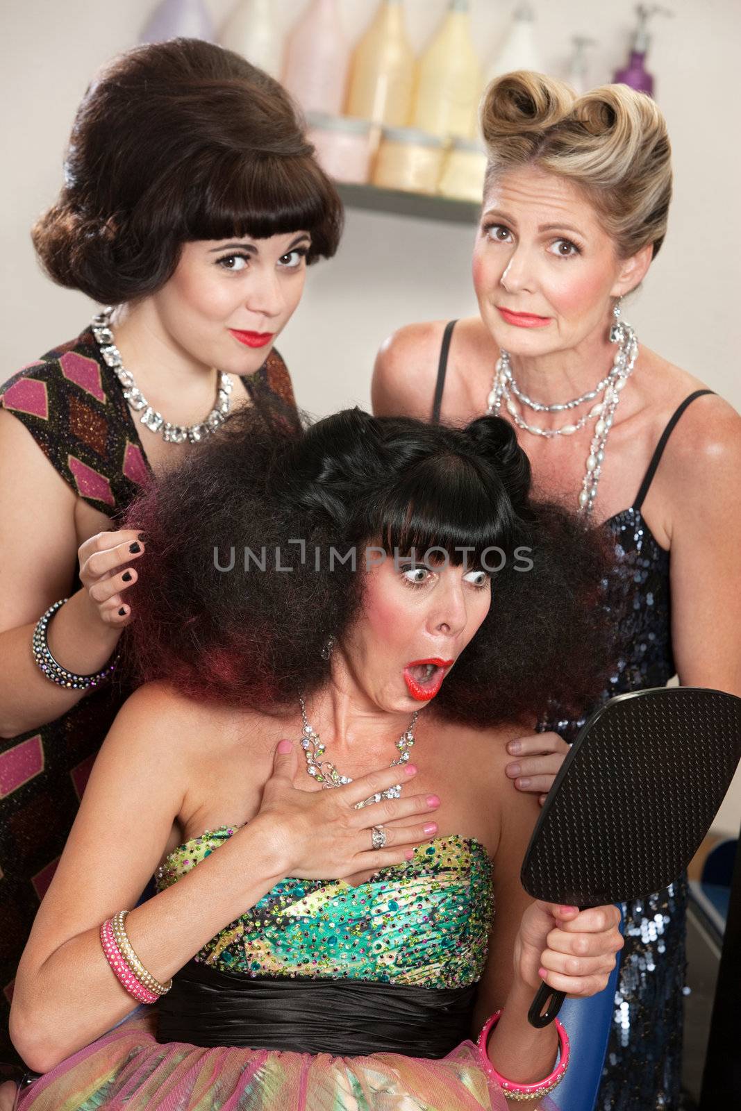 Sympathetic friends and upset woman in beauty salon