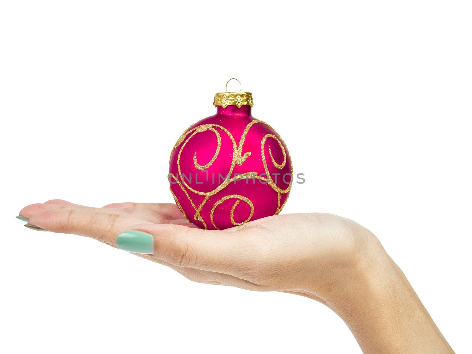 female woman hand holding Christmas ball