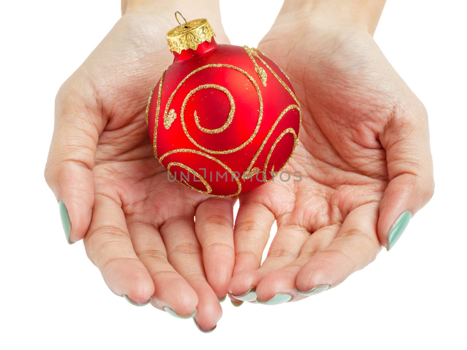 female woman hand holding Christmas ball