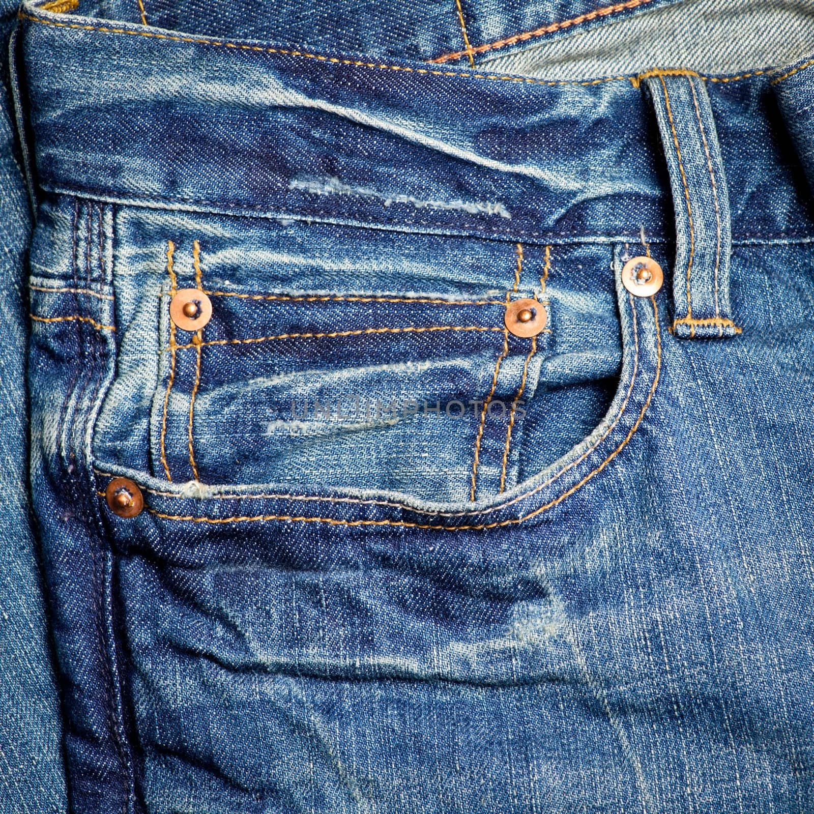 Blue jeans detail with empty pocket
