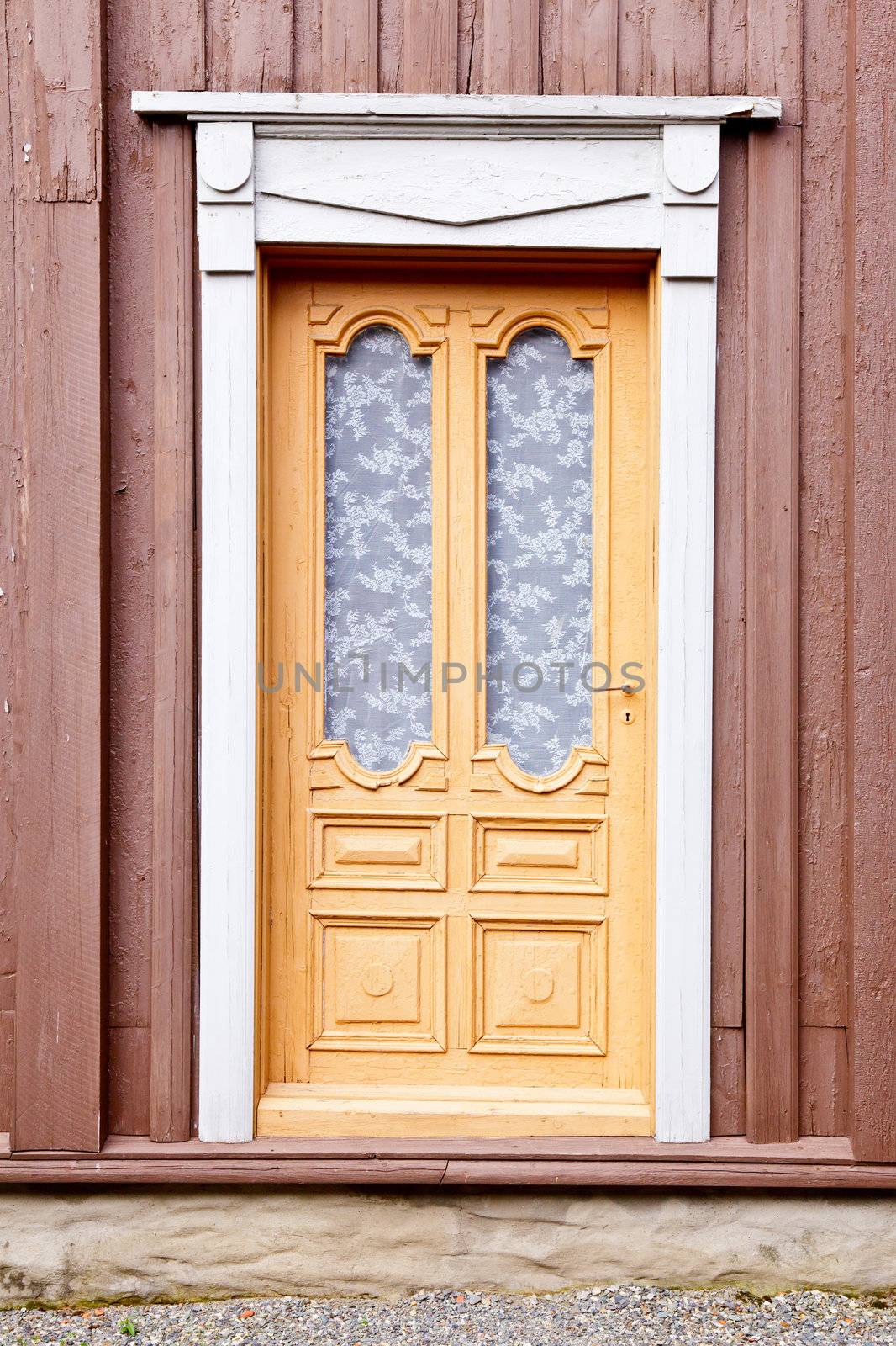 Old ornate wooden door in Norway