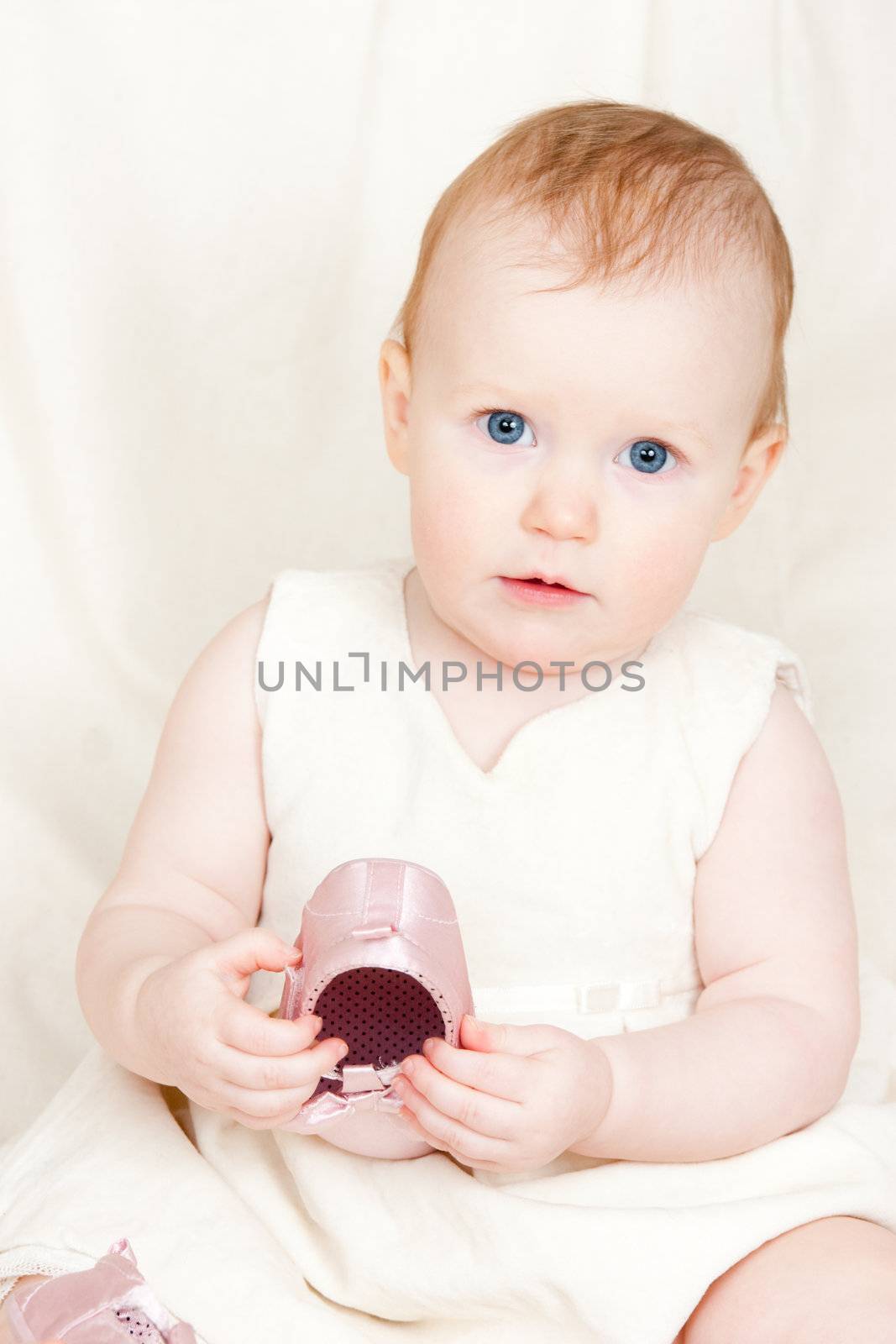 Infant with shoe by naumoid