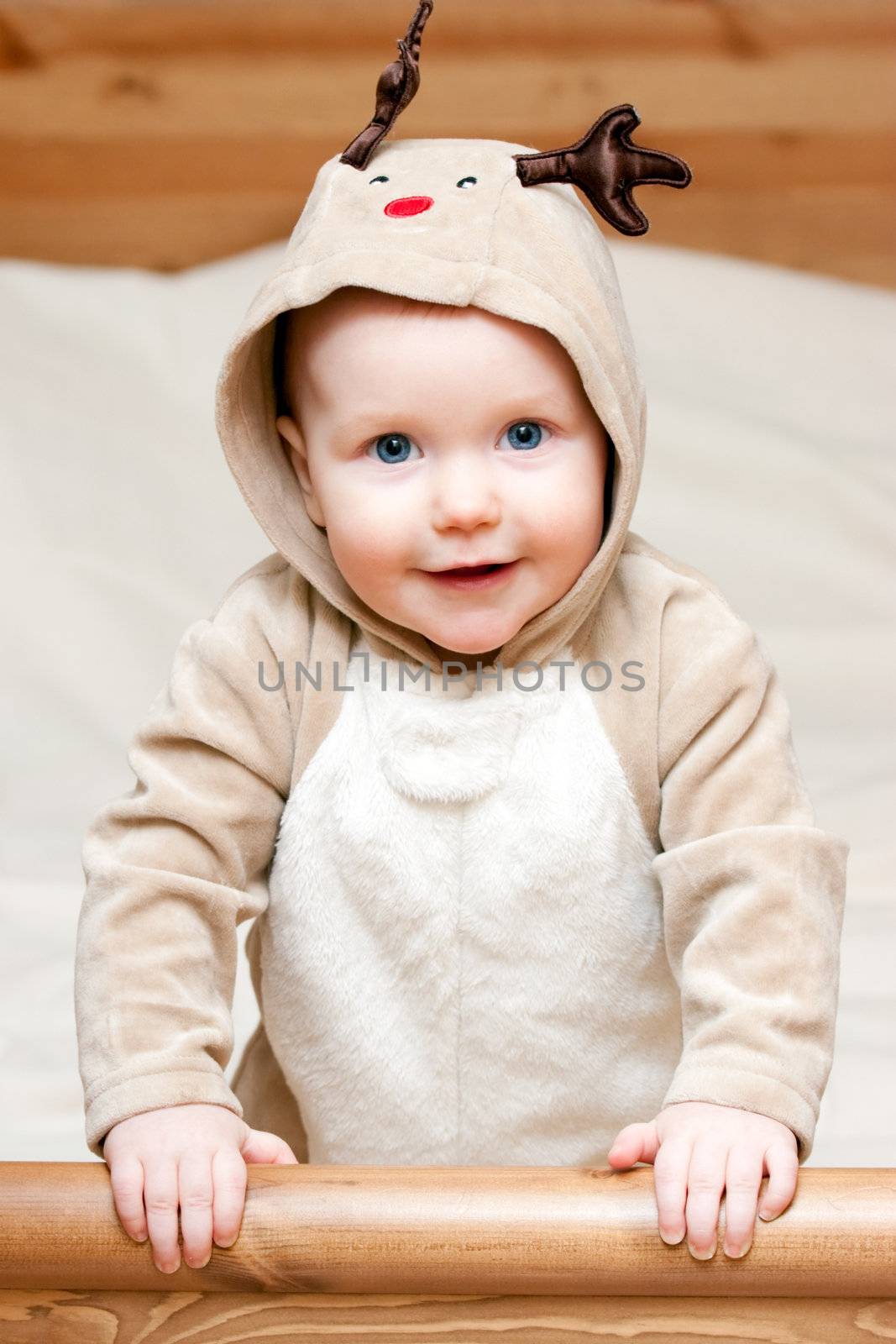 Infant in deer costume by naumoid