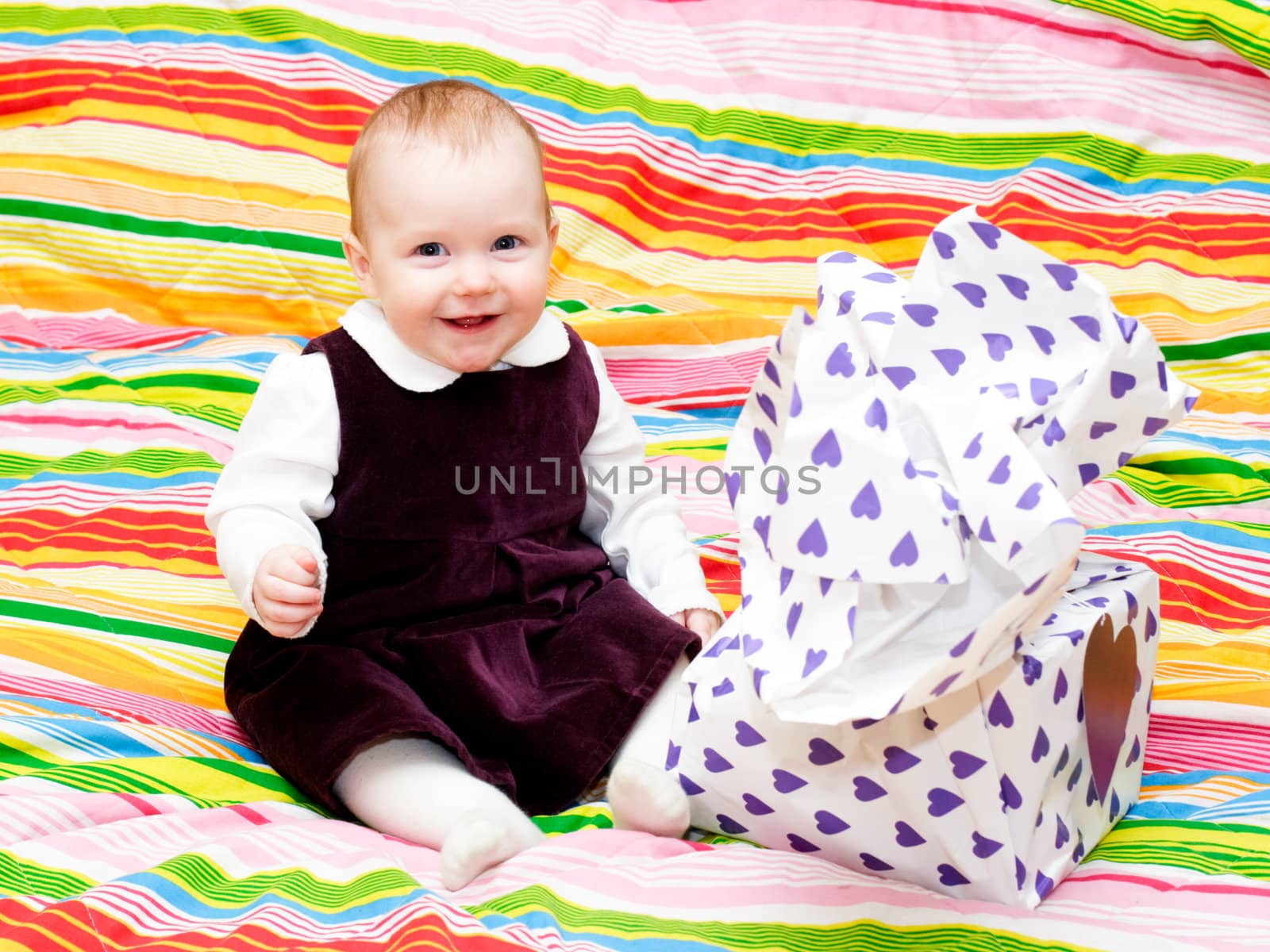 Happy infant with gift by naumoid