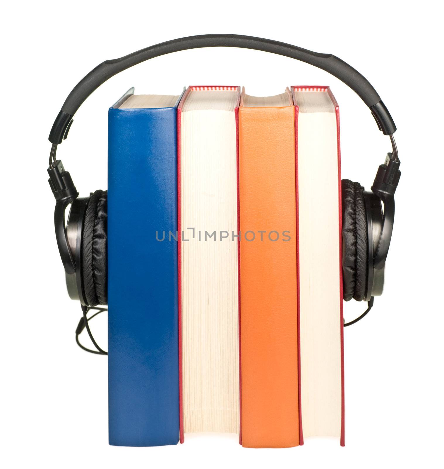 Books row with HI-Fi headphones on white background