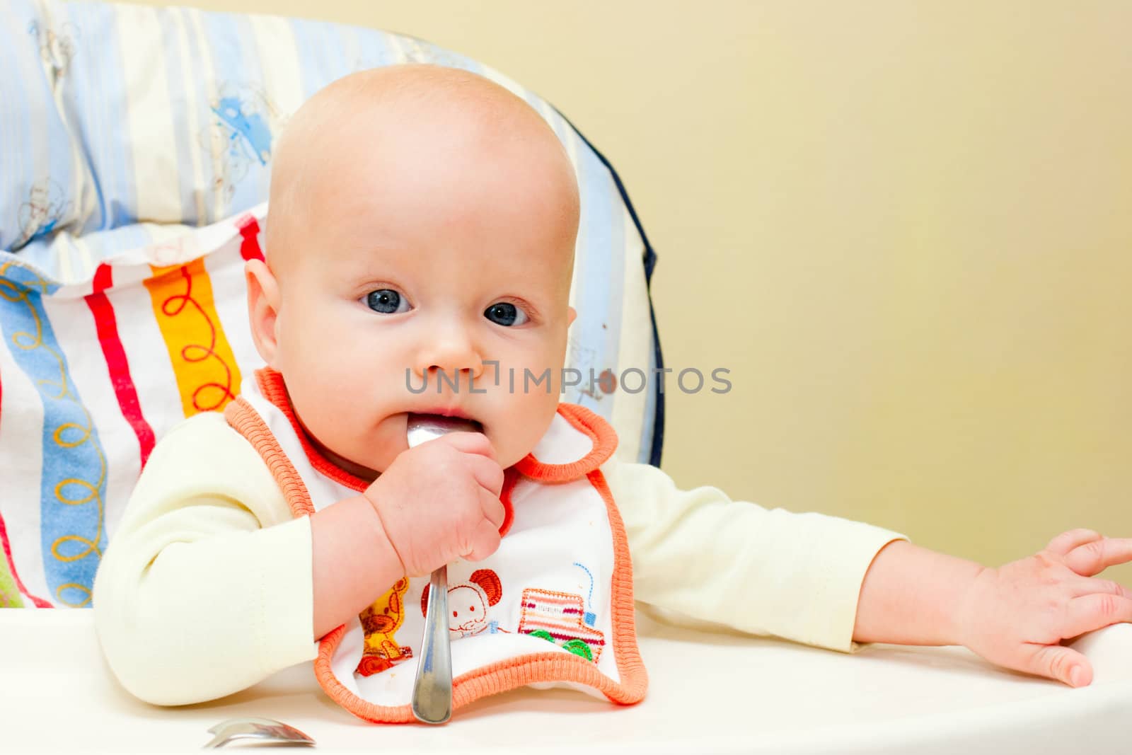 Infant with spoon by naumoid