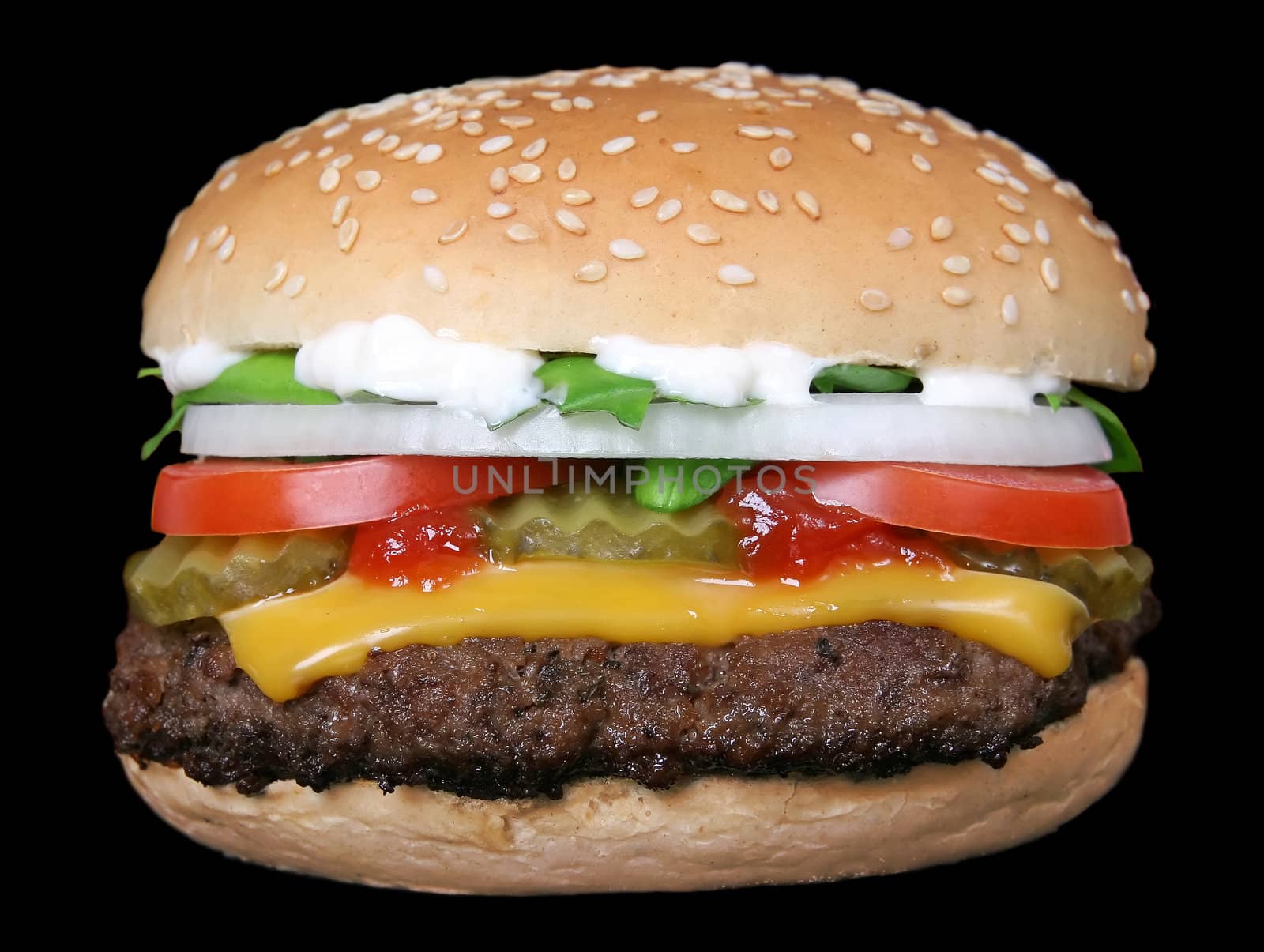 Silhouette of a cheese burger loaded with summer garden vegetables isolated on fire, macro