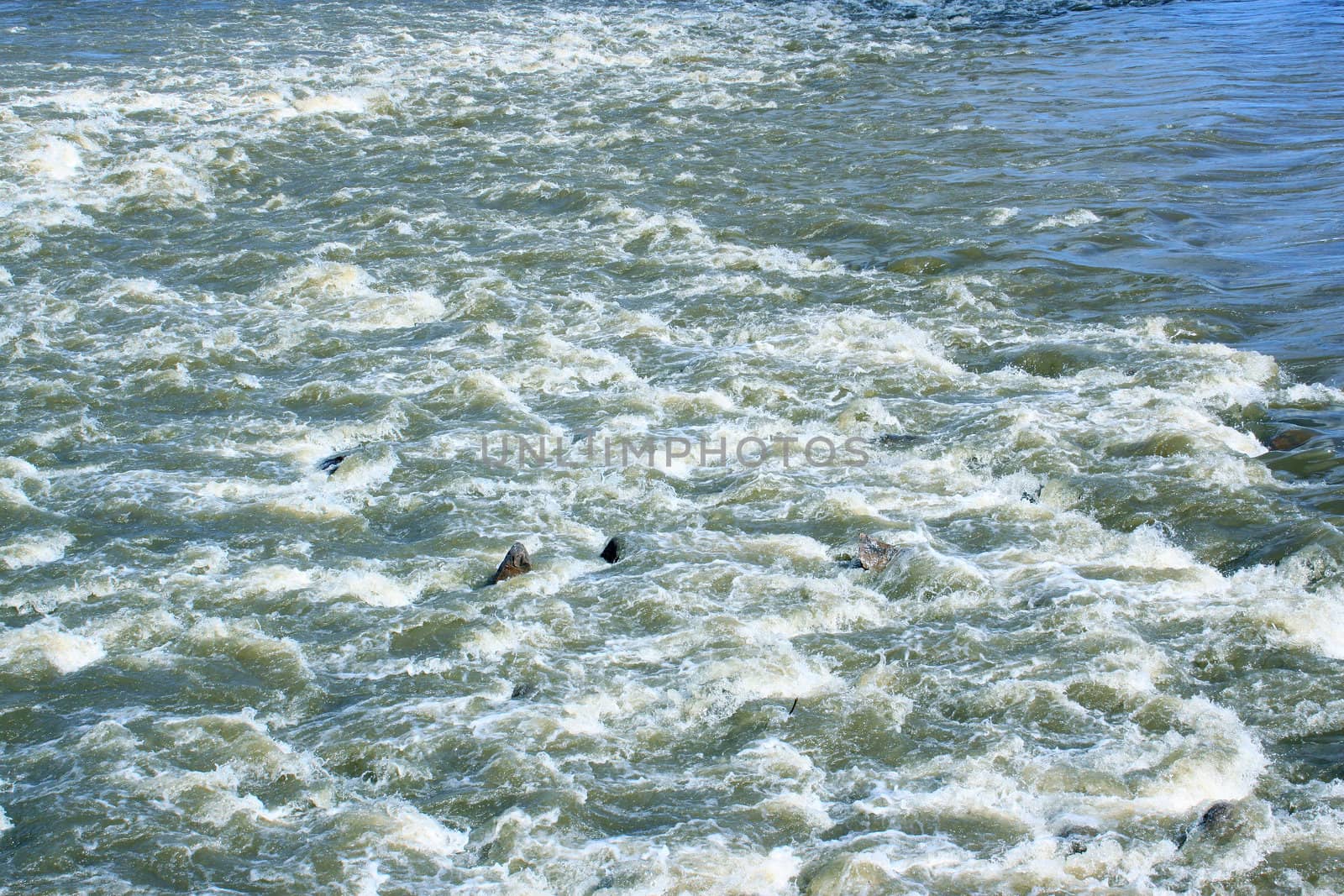 surface waves, eddies in the water or a river flood