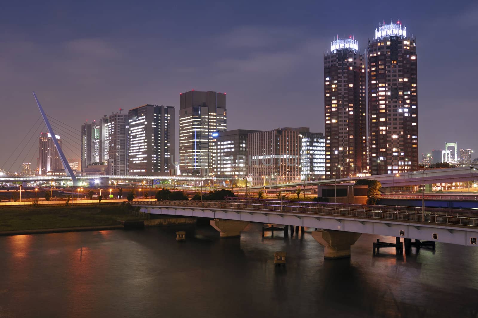 modern buildings of Odaiba district  in Tokyo Japan well illuminated by night
