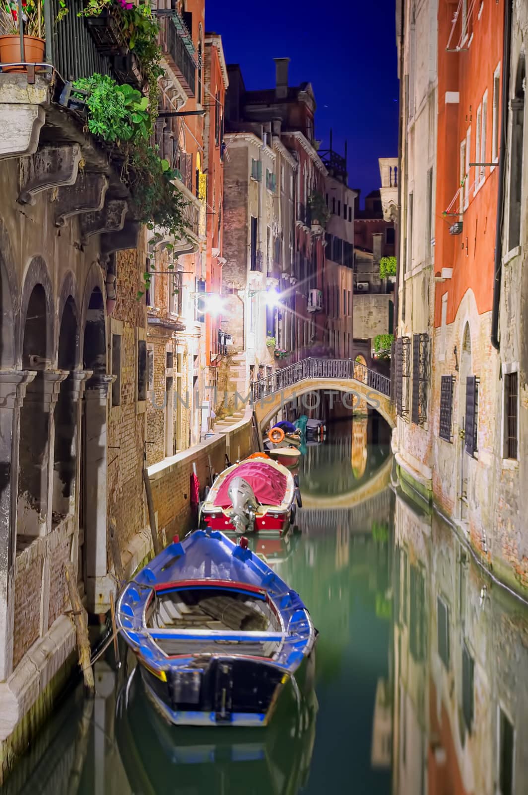 boats and water near buildings of Venice, Italy. Night scene