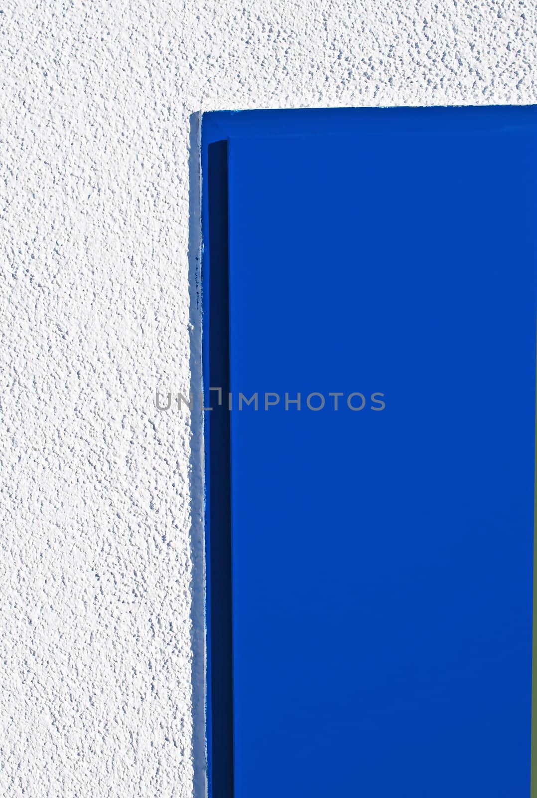 blue door and white wall by Jochen