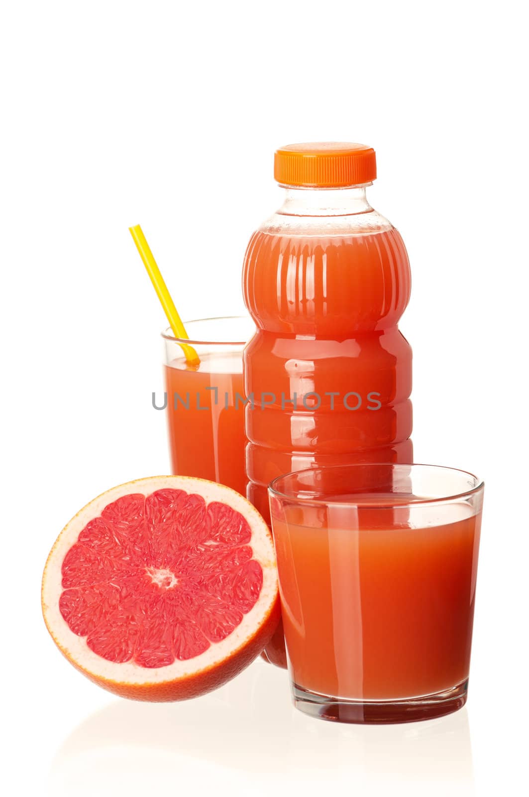 Grapefruit juice in plastic bottle and grapefruit fruits on white background