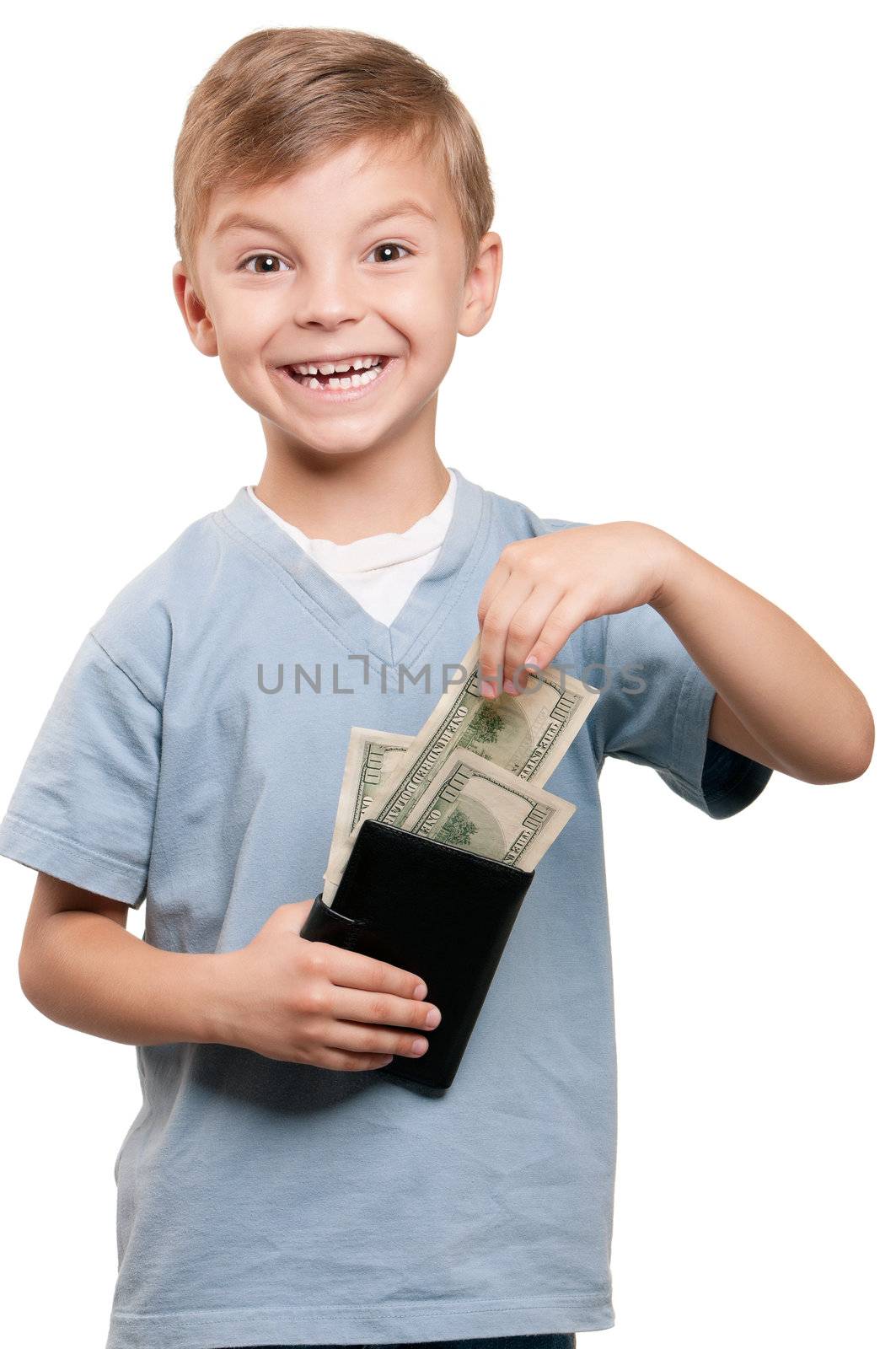Portrait of a happy little boy with a dollars over white background