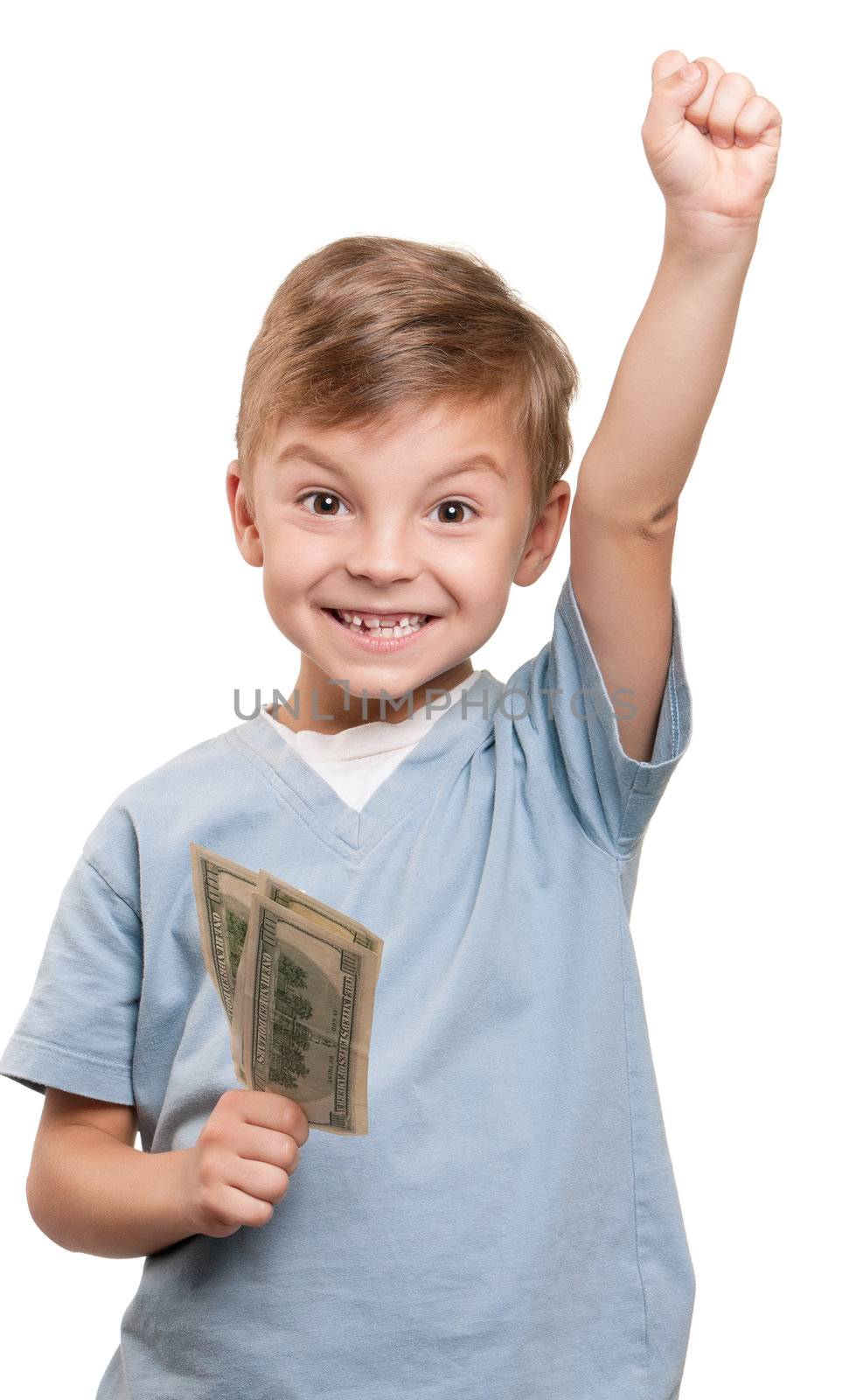 Portrait of a cheerful little boy holding a dollars over white background