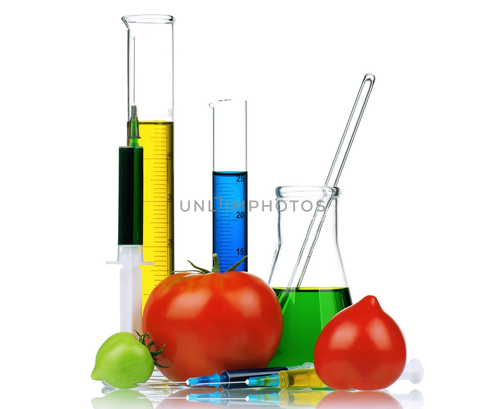 Genetically modified organism - ripe tomato with syringes and laboratory glassware on white background