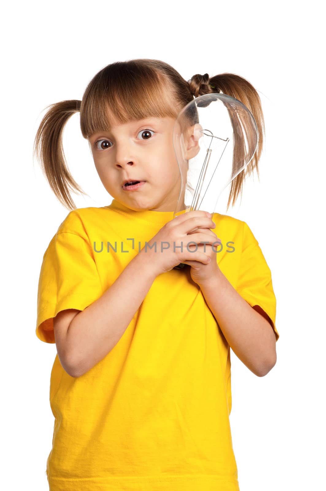 Portrait of surprised little girl with light bulb isolated on white background