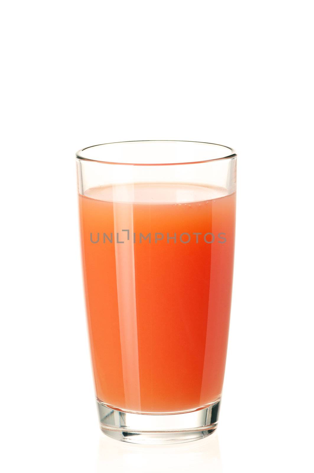 Glass of fresh grapefruit juice on white background