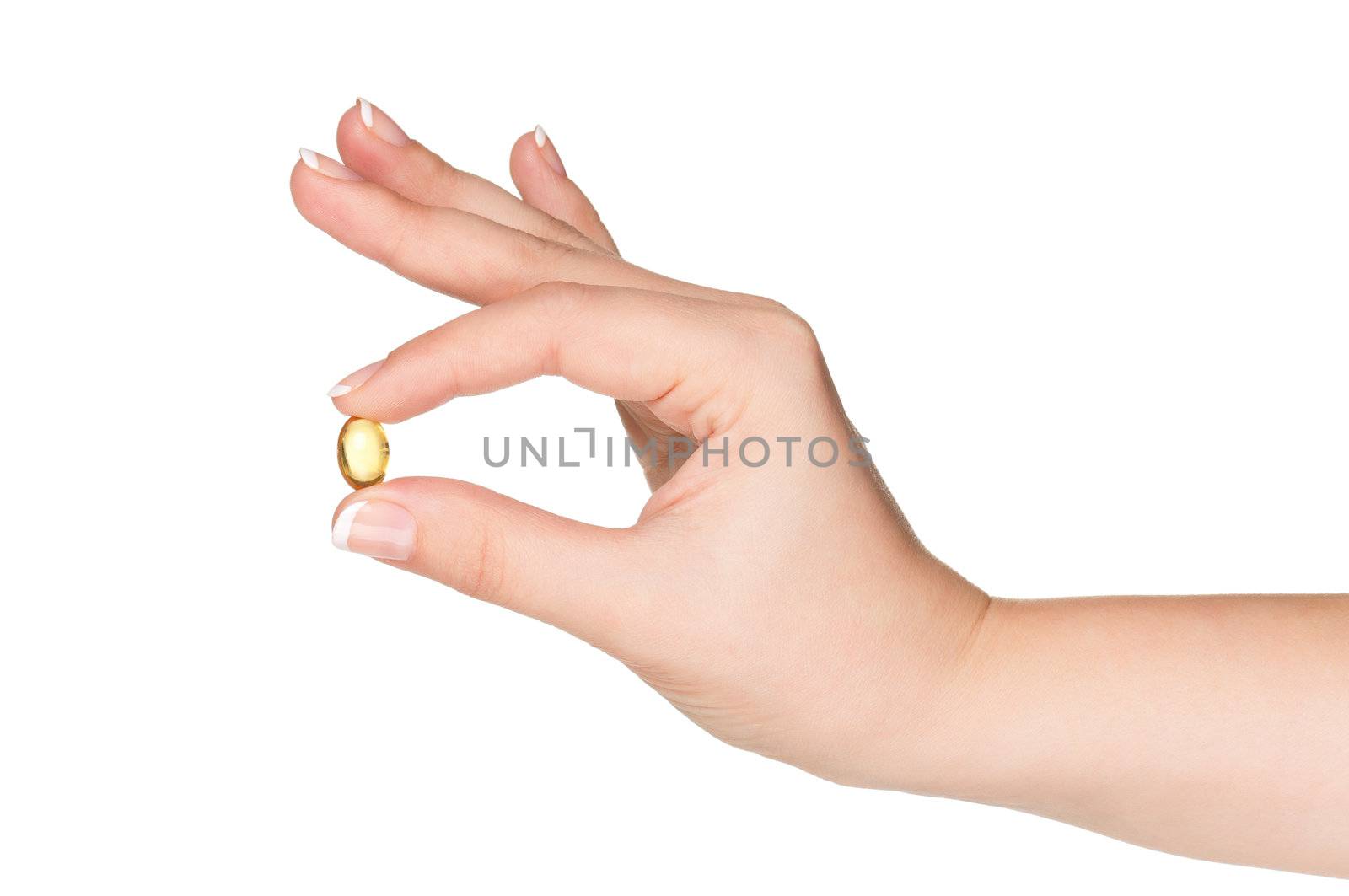 Pills in woman hand isolated on white background