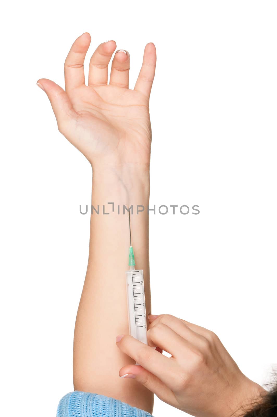 Woman hands with syringe isolated on white background