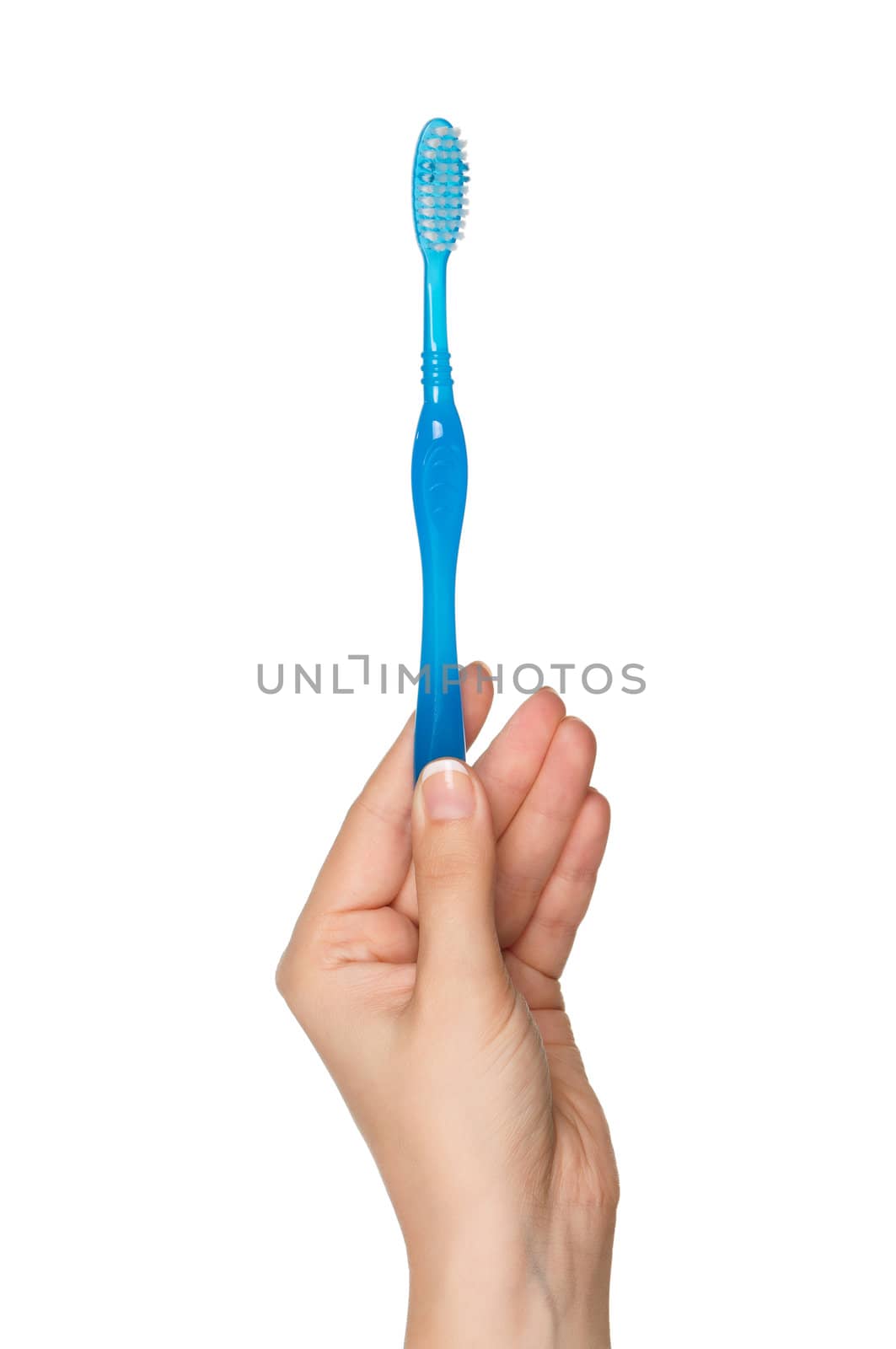 Hand with tooth brush by fotostok_pdv