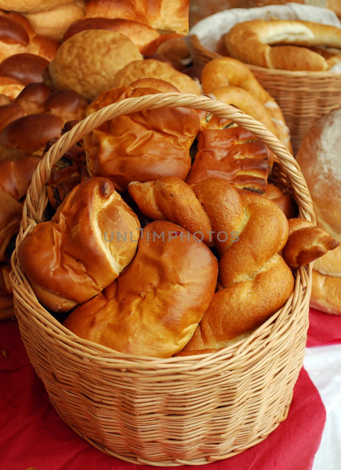 Wooden basket with bread and croissant