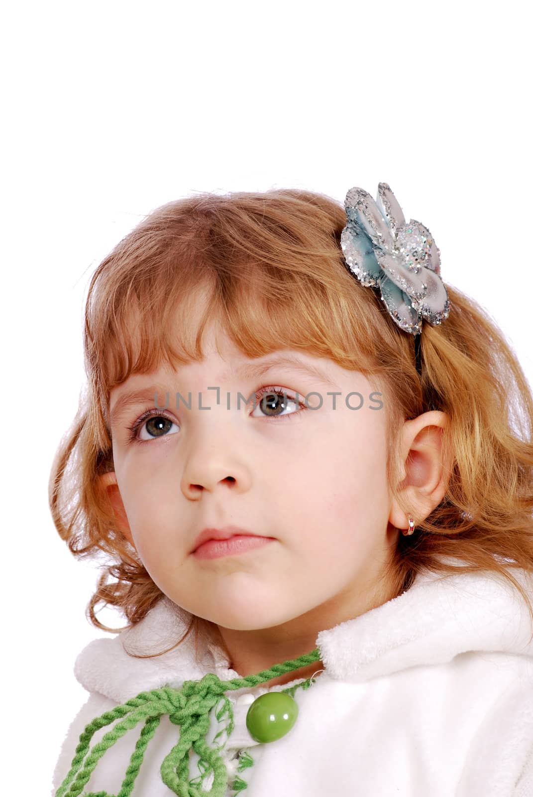Beautiful little girl portrait with flower hairstick
