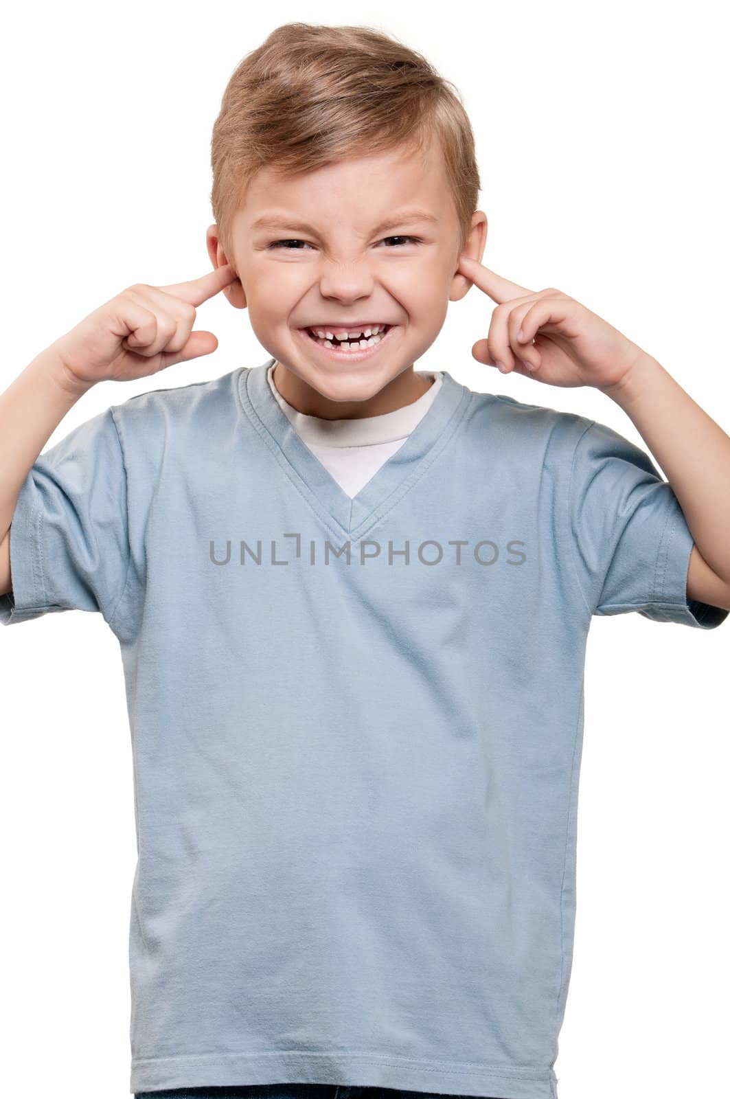 Hear no evil - Portrait of funny little boy over white background