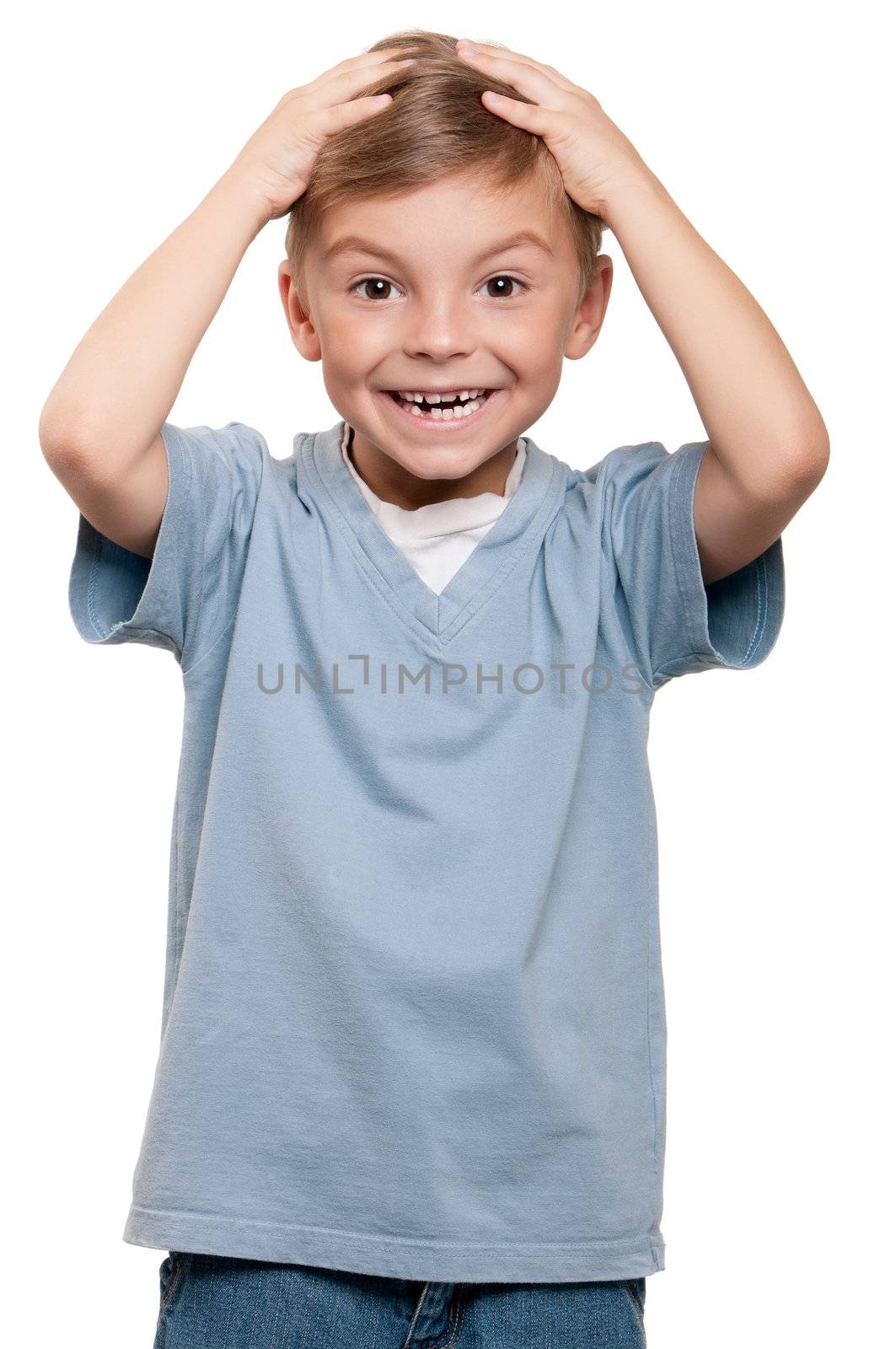 Portrait of funny little boy over white background