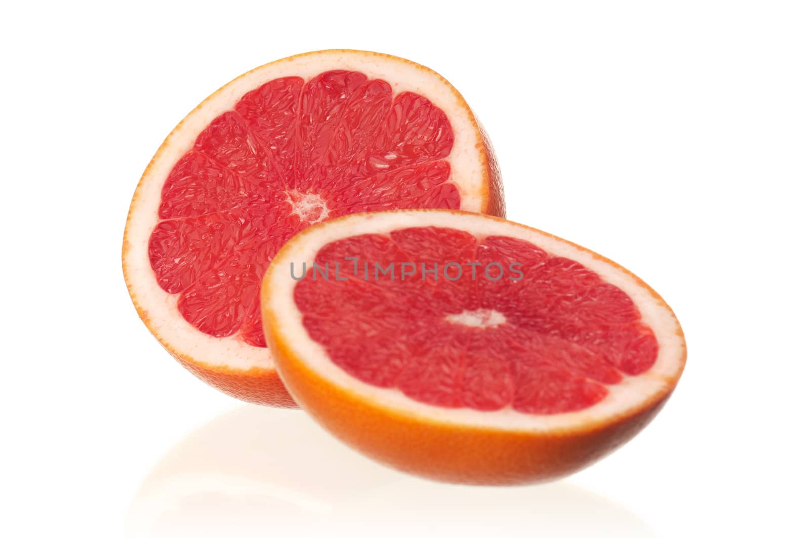 Fresh ripe half grapefruit on white background