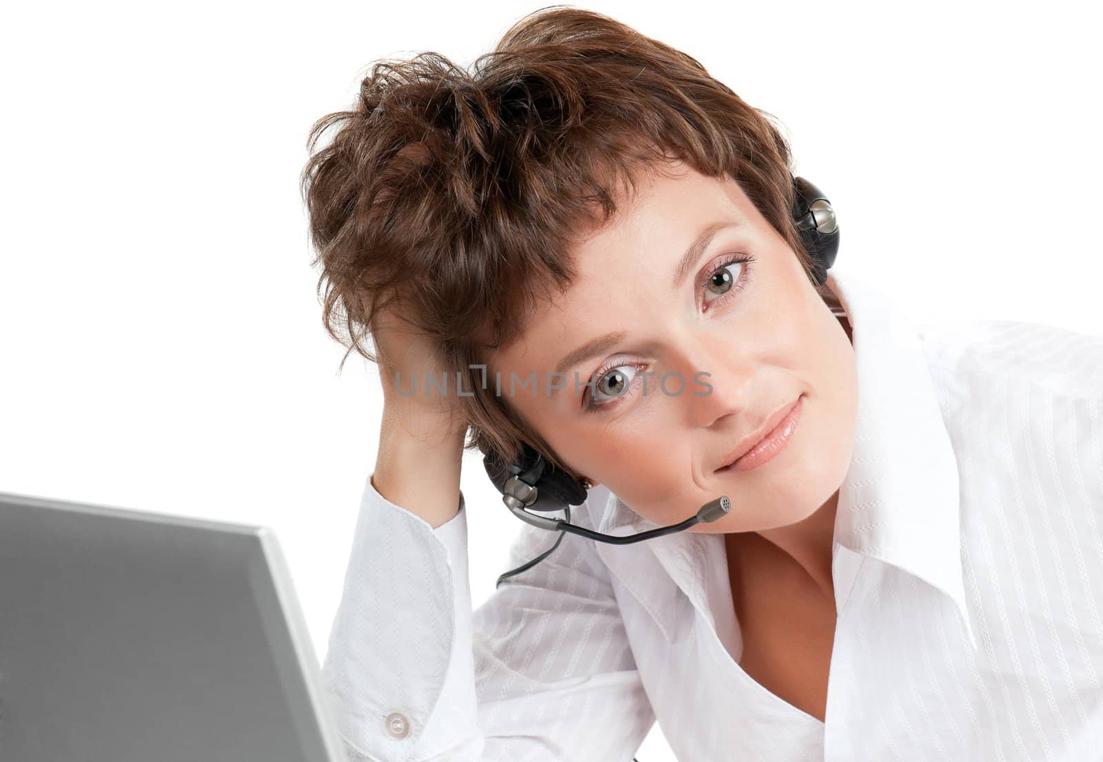 Portrait of a friendly woman with headset on white background