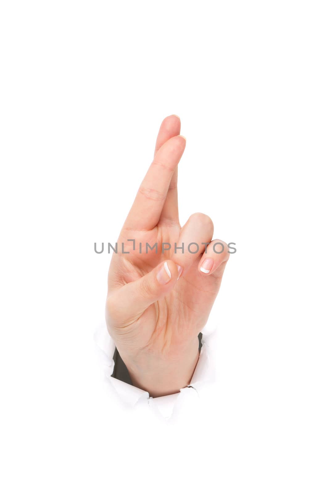 Woman hand making sign through a hole in paper isolated on white background