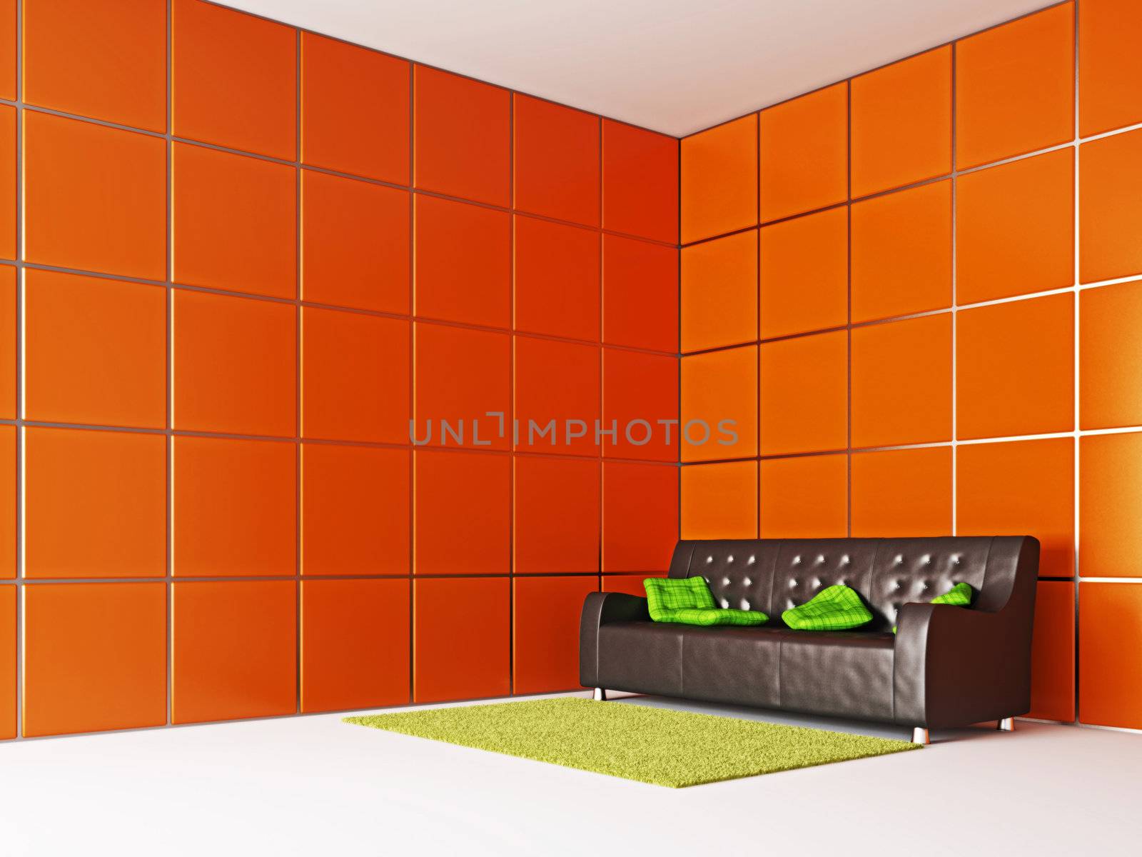 The leather sofa near the red wall