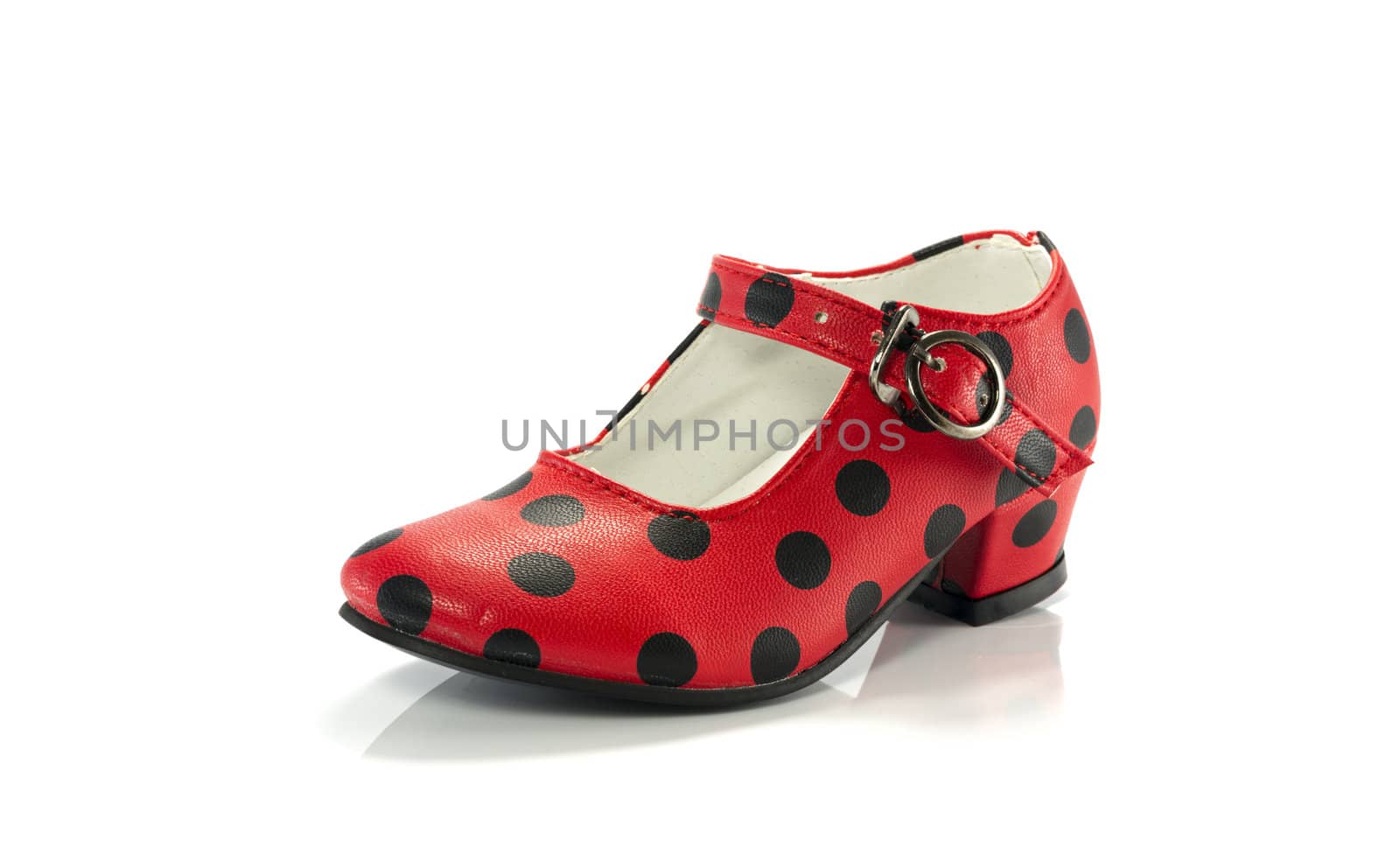 red shoe with black dots isolated on white