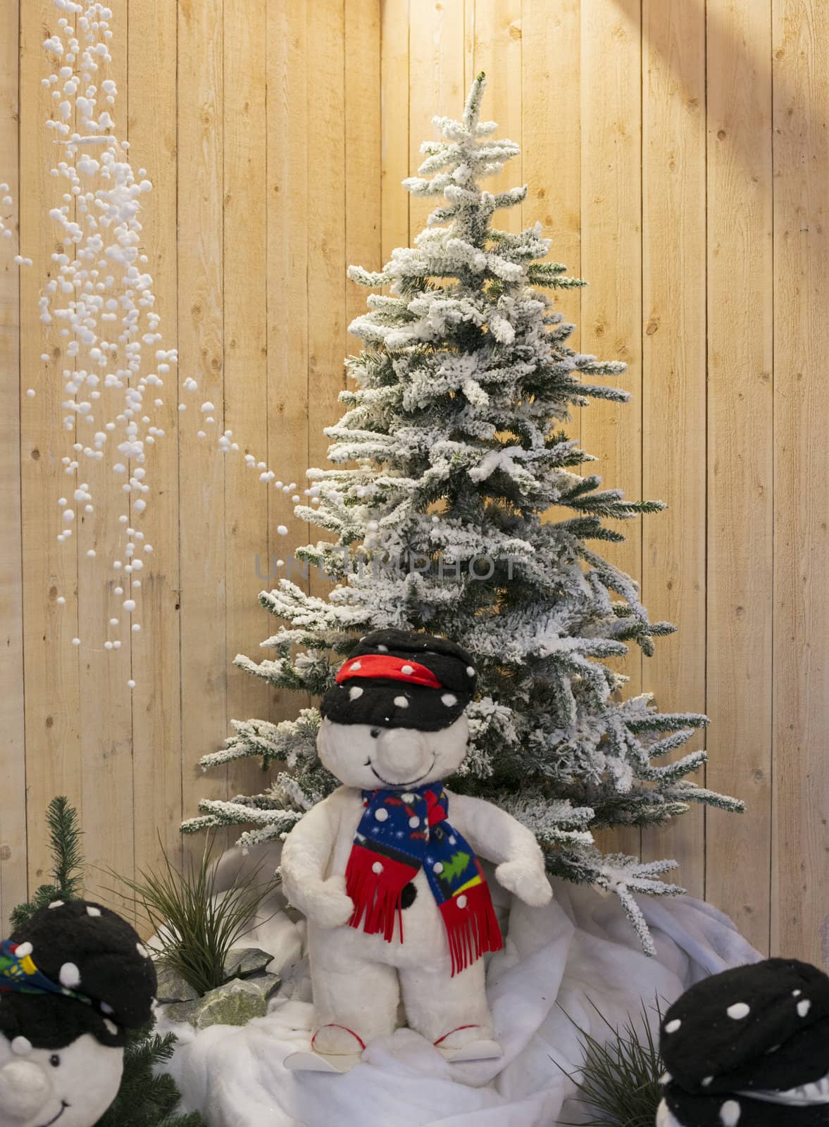 christmas tree with toys and snow