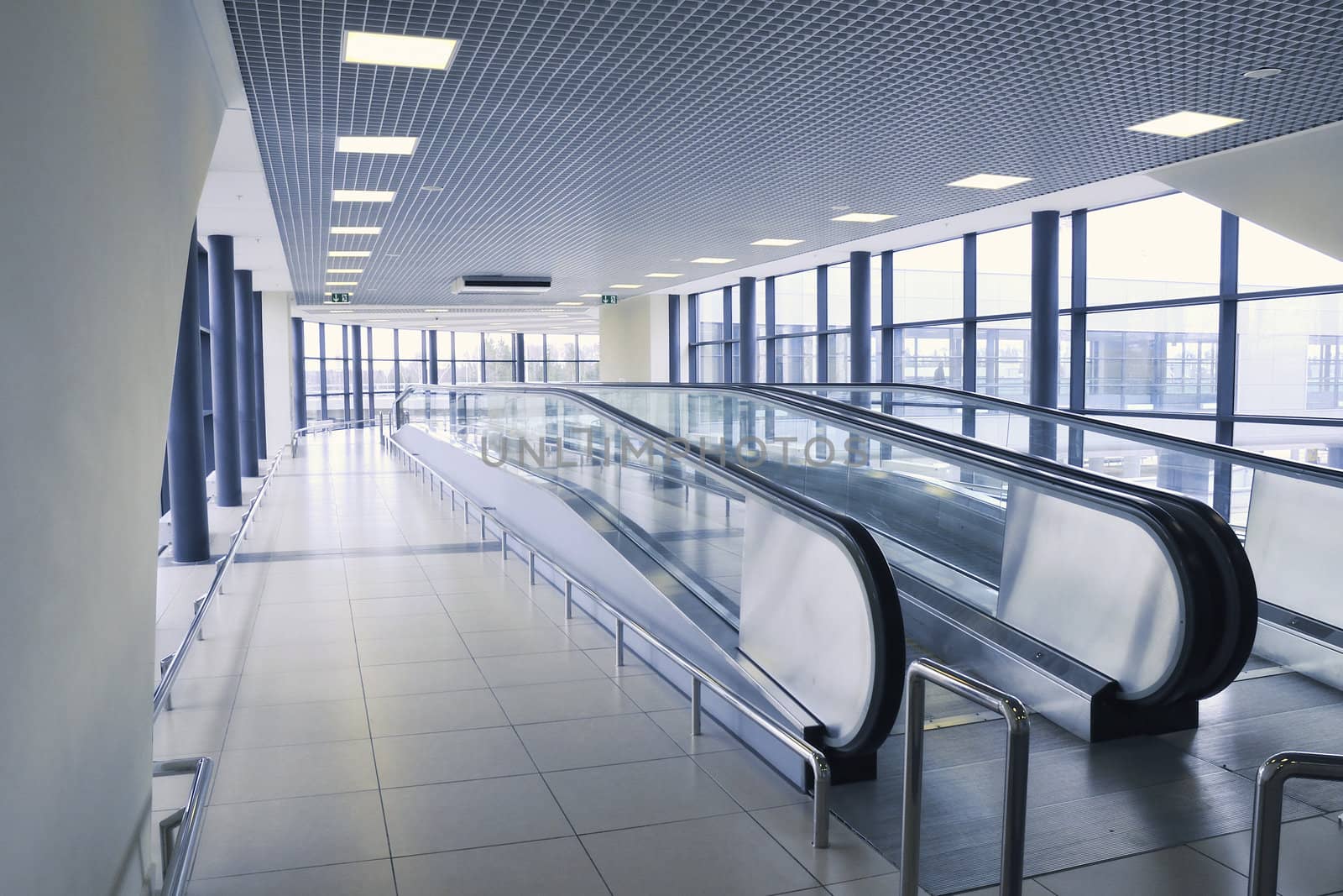 pedestrian pathway inside modern airport building