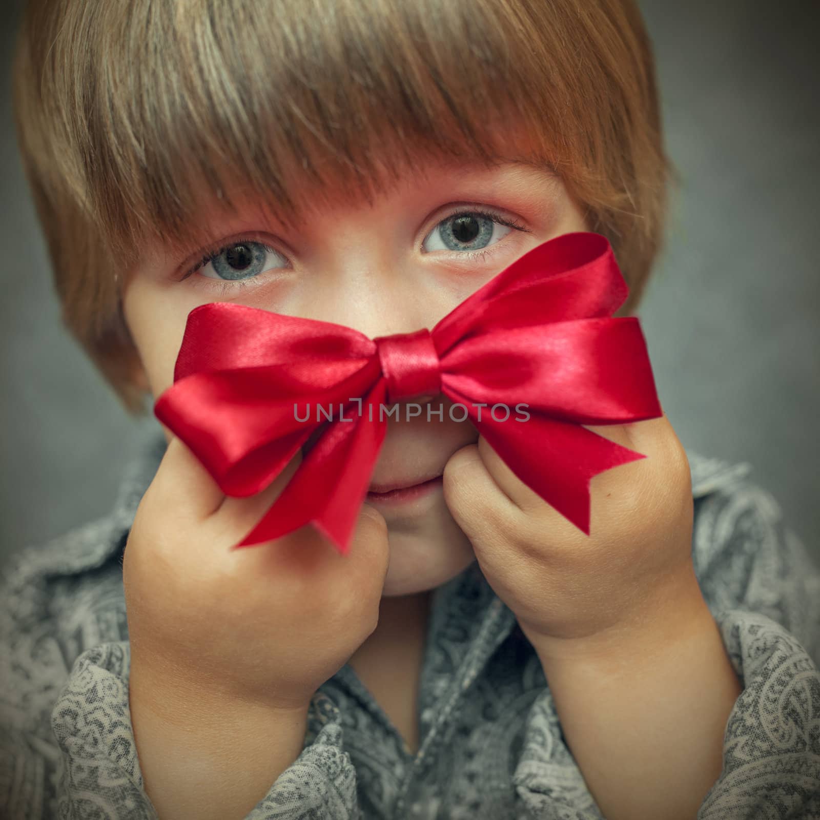 Small baby with silver gift box by anelina