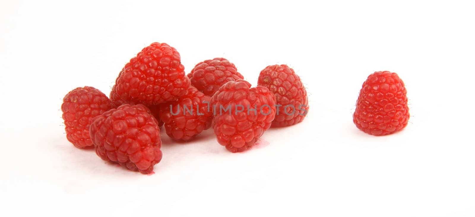 A few pieces of fruit on white