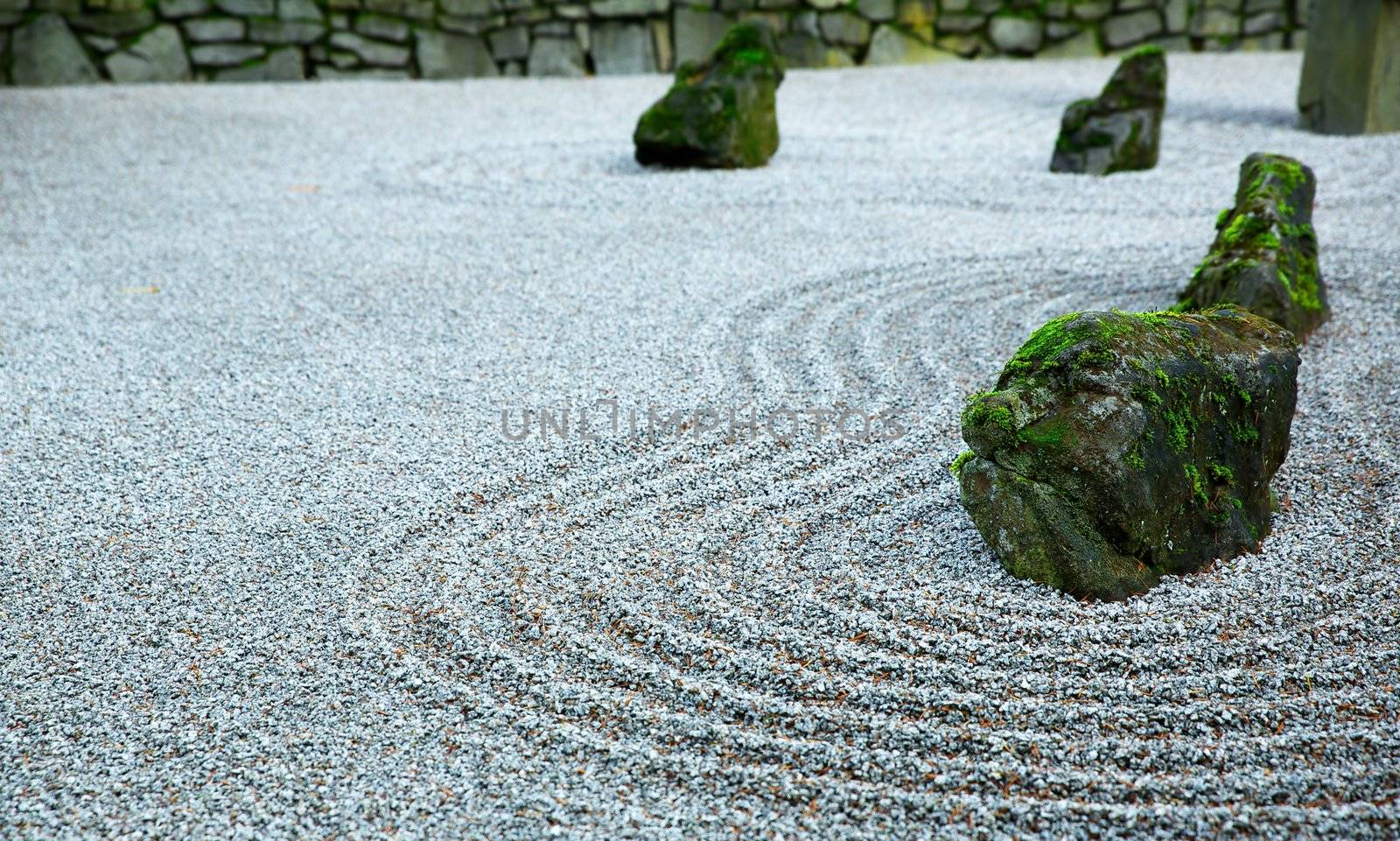 Zen Garden on Dark day with moss covered rocks