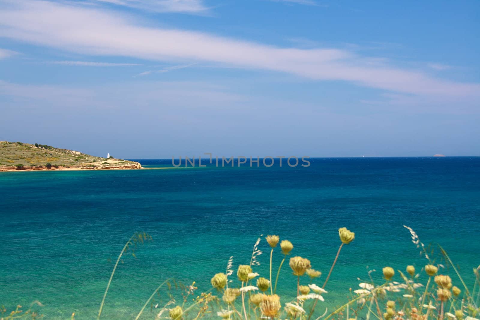 sea view from izmir with lighthouse under blue sky