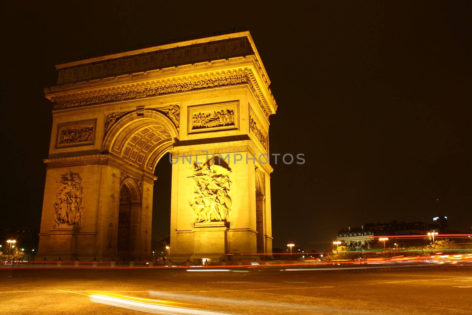 Arc de Triomphe in champs-elysees photographed in night