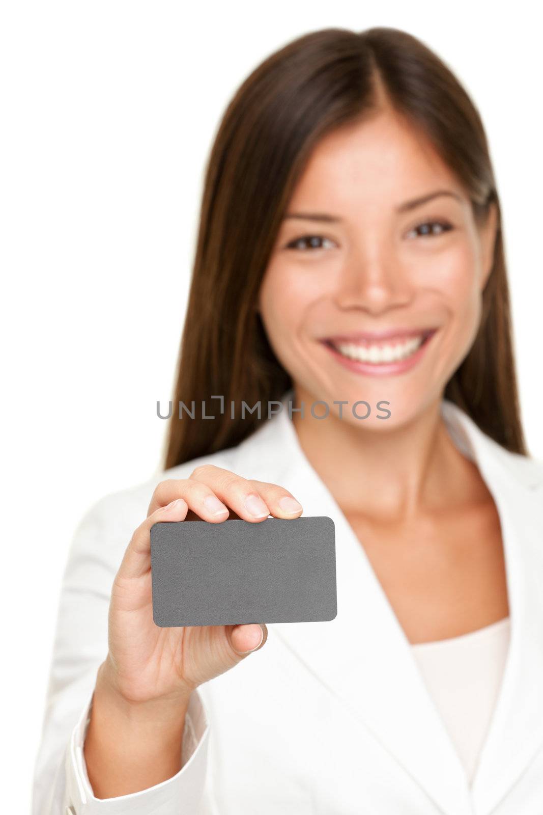 Attractive business woman holding a blank gray card