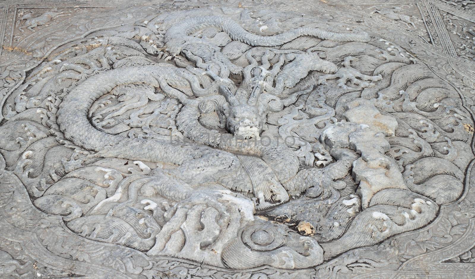 Dragon culptures on the stone pavement inside Forbidden City, Beijing