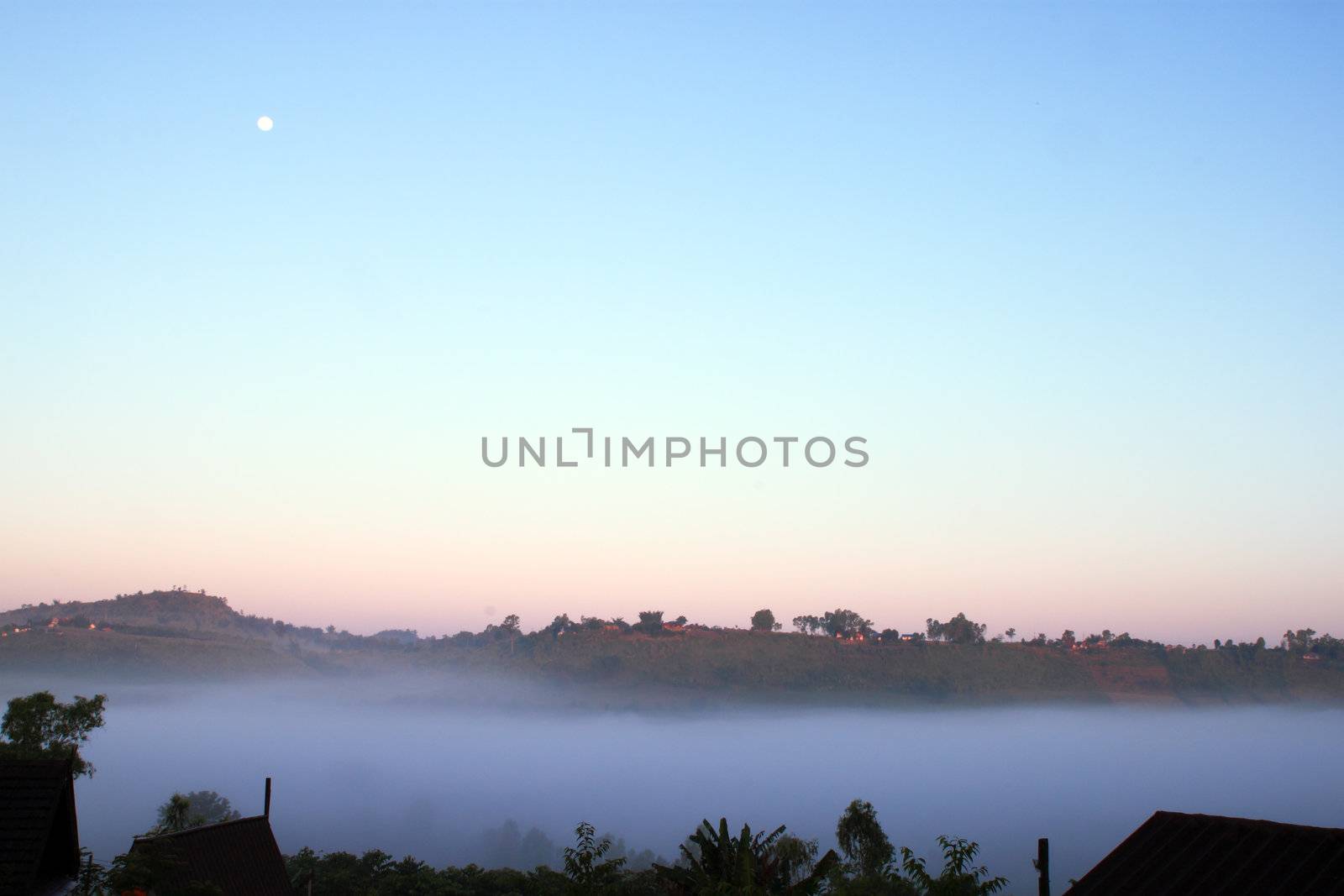 resort in foggy morning at KhouKho Thailand mountain by geargodz