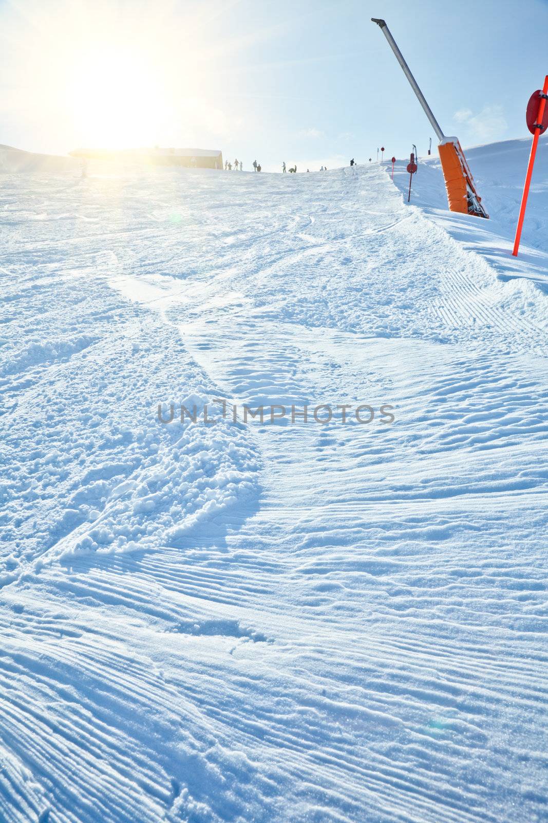 Fresh snow on a ski slope at Val Di Fassa ski resort in Italy