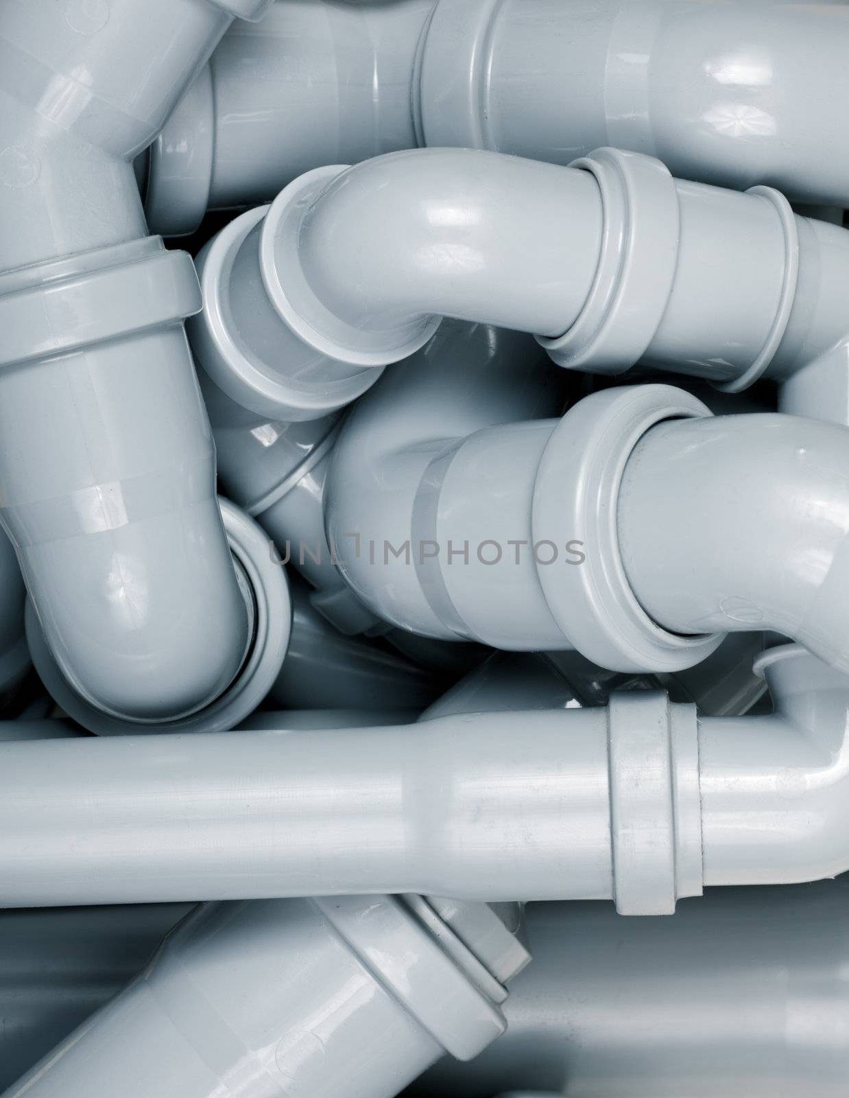 Grey PVC sewer pipes background